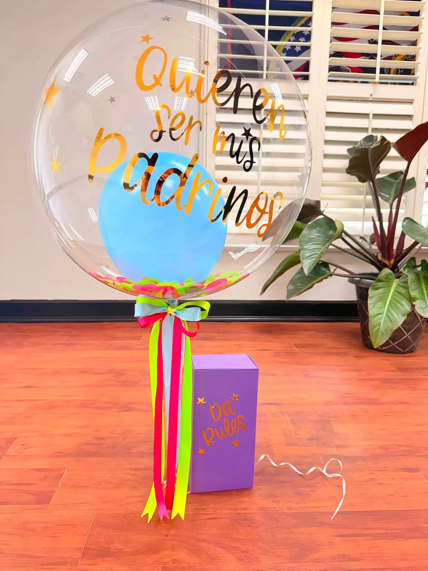 Personalized clear balloon gift with colorful ribbons